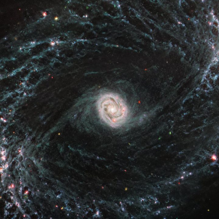 Barred spiral galaxy NGC 1433 takes on a completely new look when observed by Webb’s Mid-Infrared Instrument (MIRI).