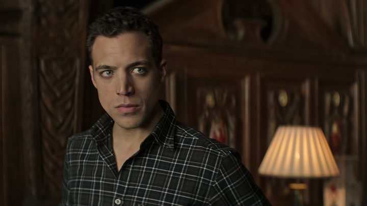 Roald from season 4 of You looking angry.