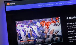 NFL Sunday Ticket info as seen on a TV.