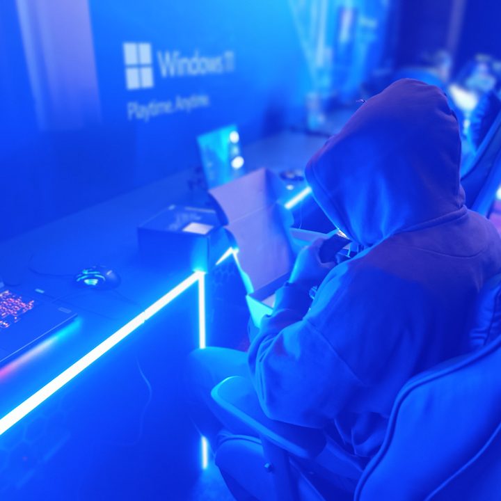 Gamer wearing dak colored hoodie captured by Redmi Note 12 Pro Plus.