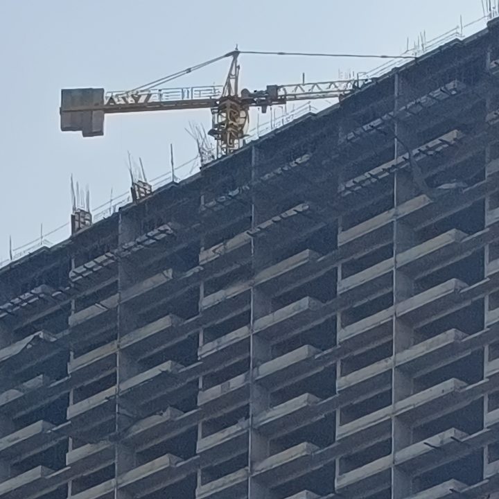 Close up of a Multi-storey building under construction captured by Redmi Note 12 Pro Plus.