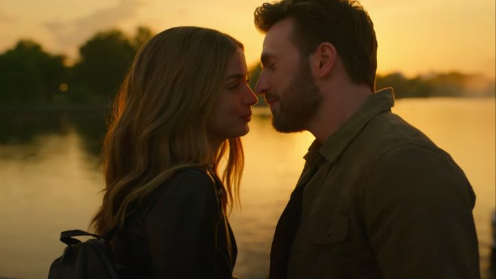 Ana de Armas and Chris Evans as Sadie and Cole about to kiss in the 2023 movie Ghosted.