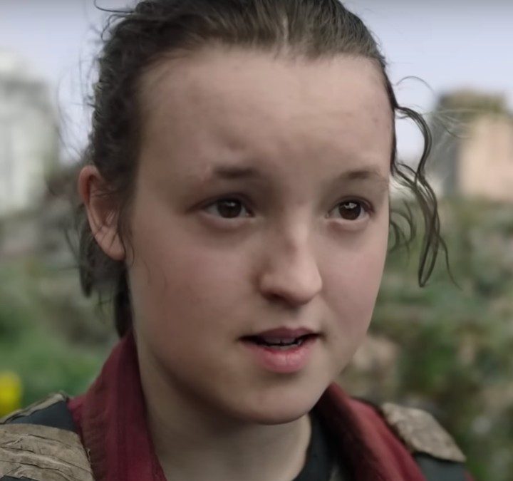 A young girl stares and looks in the Last of Us.