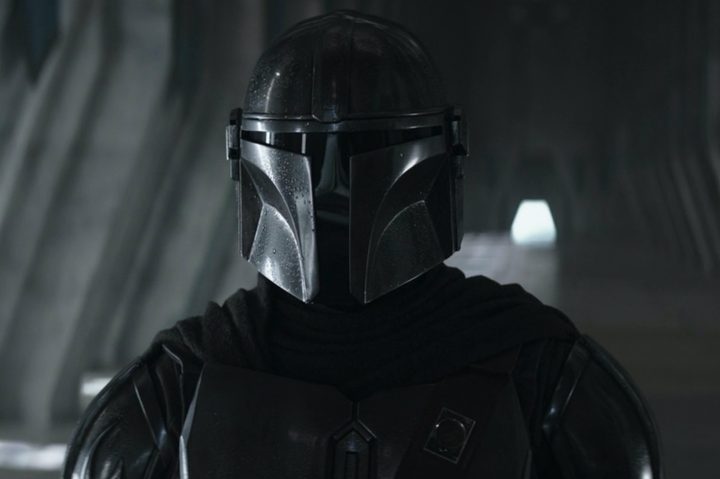 Din Djarin stands in Bo-Katan's castle in The Mandalorian Season 3 Episode 1.