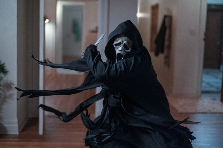 Ghostface swings a knife in Scream 6.