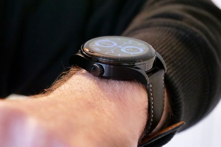 The Huawei Watch Buds on a person's wrist.