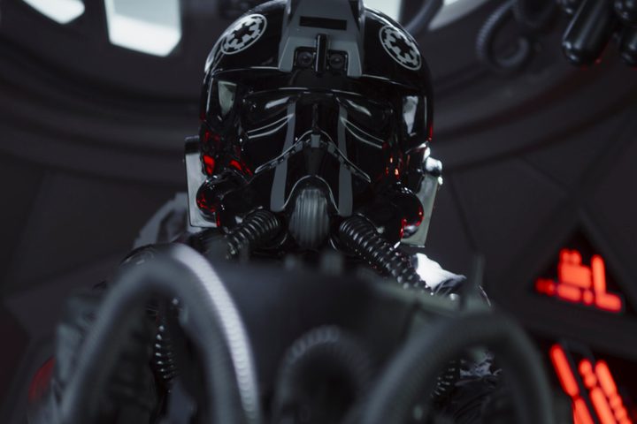An Imperial pilot sits in a TIE Interceptor cockpit in The Mandalorian season 3 episode 3.