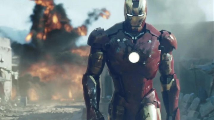 Iron Man walking away from an explosion in the 2008 movie.