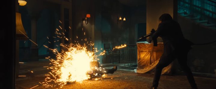 John shooting someone with the "dragon's breath" in "John Wick: Chapter 4."