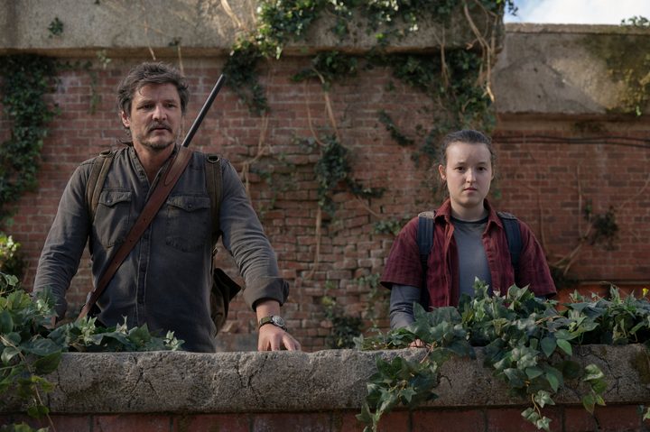 Joel and Ellie stand on a rooftop together in The Last of Us Episode 9.