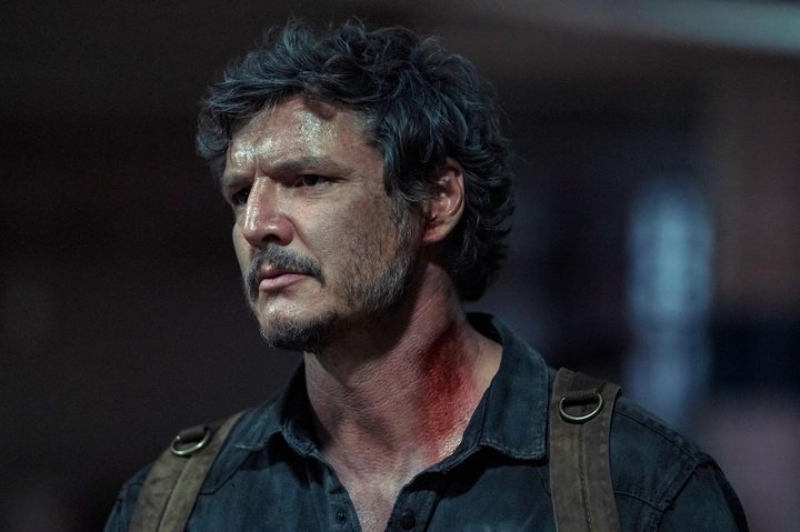 Joel stands with a bleeding neck in The Last of Us Episode 9.