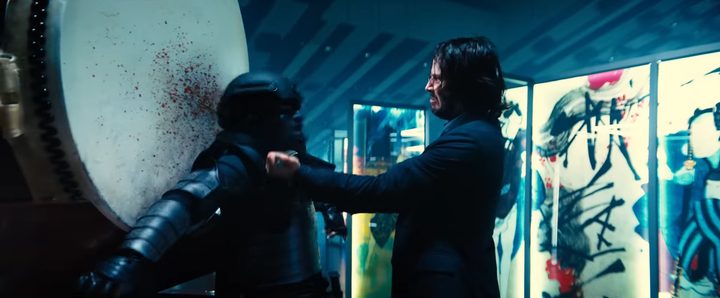 John shooting someone in "John Wick: Chapter 4."