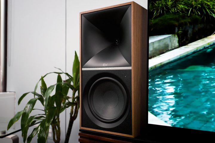 A left channel Klipsch The Nines speaker next to a TV.