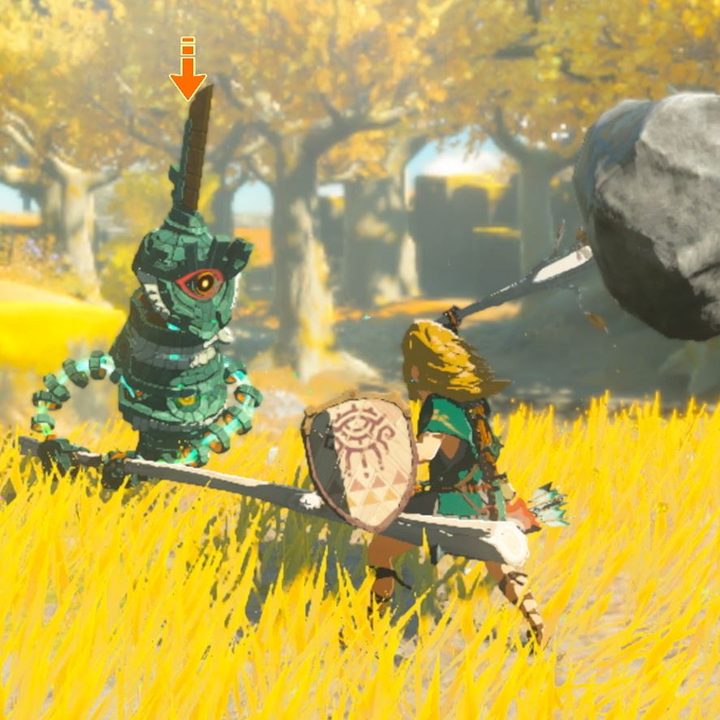 Link fights a Construct with a fused weapon in The Legend of Zelda: Tears of the Kingdom.