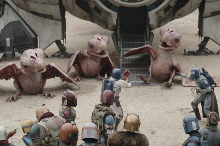 Mandalorian warriors lure out three baby raptors in The Mandalorian season 3 episode 4.