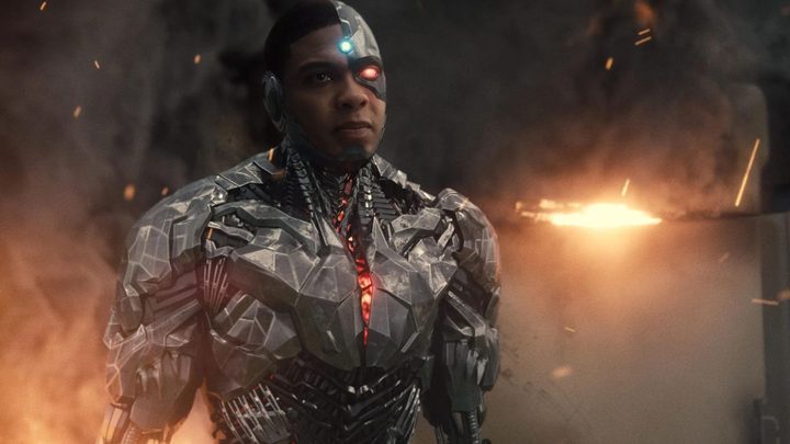 Cyborg standing in front of a wall of smoke and fire in Zack Snyder's Justice League.