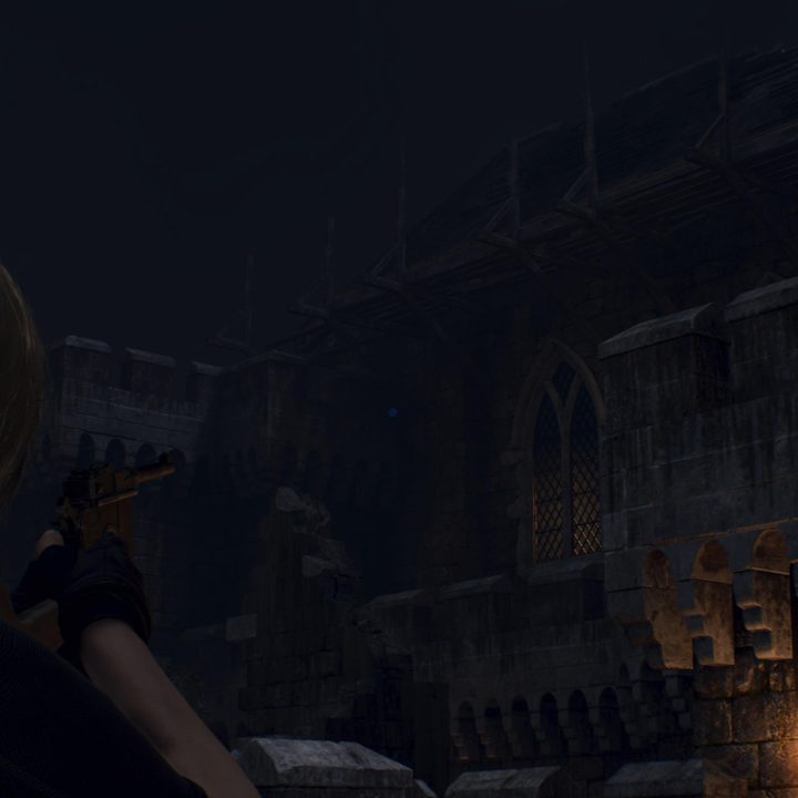 Leon looks at a blue medallion
