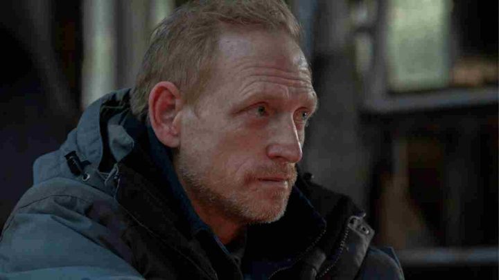 David looking intently at something off-camera in The Last of Us.