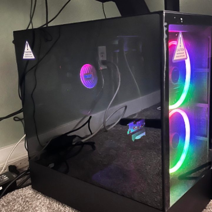 A gaming PC on a carpeted floor.