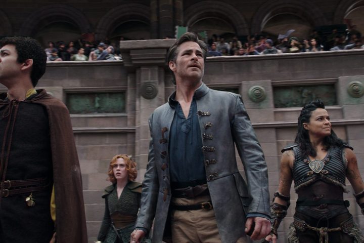 Simon, Doric, Edgin, and Holga stand in an arena in Dungeons & Dragons: Honor Among Thieves.