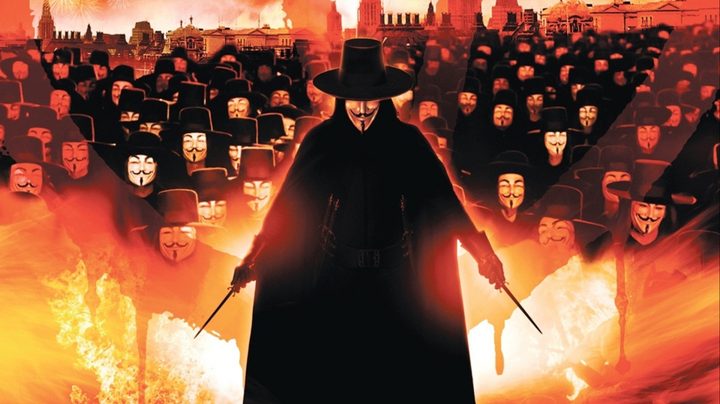 V wielding his blades while leading his army of followers.