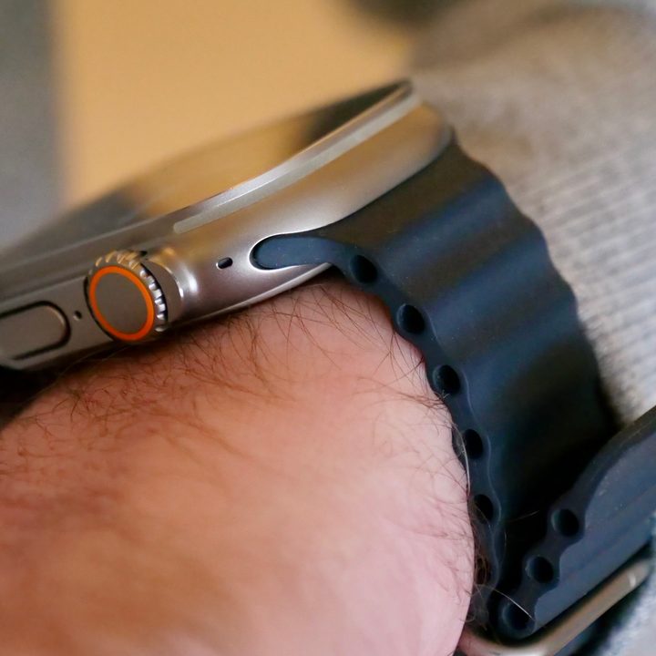 The side of the Apple Watch Ultra with the Ocean Band band.