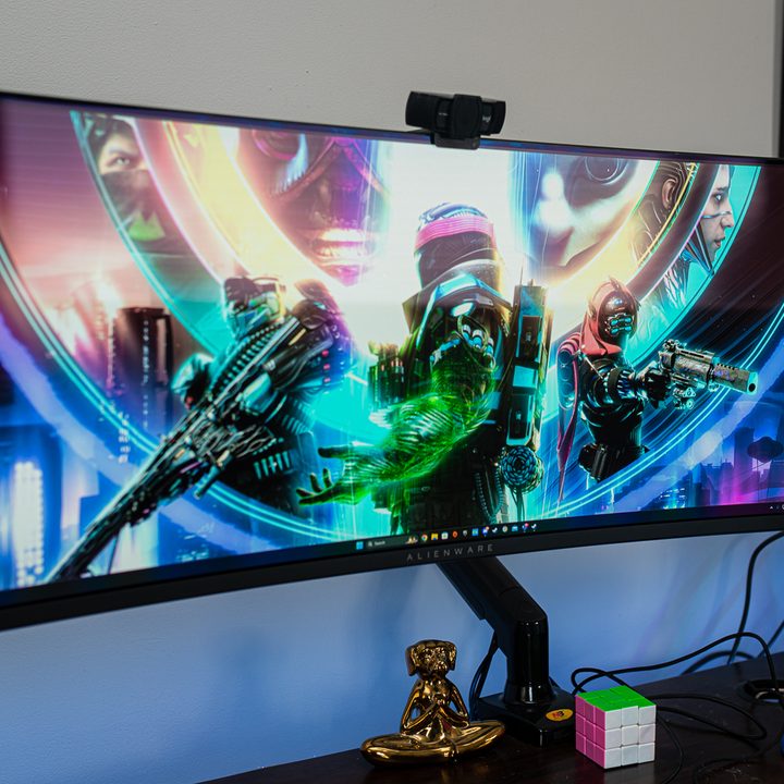 Alienware ultrawide OLED on a desk.