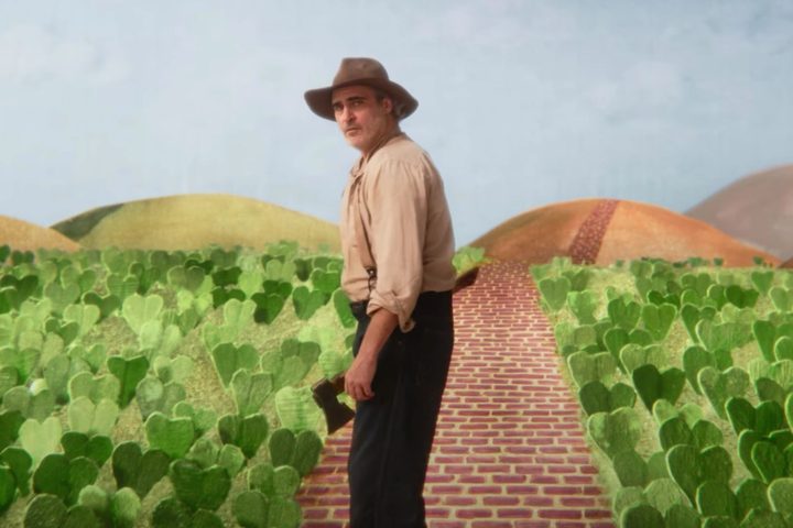 A man looks behind him in Beau is Afraid.