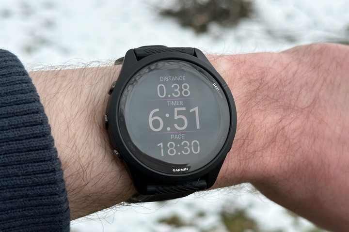 Someone wearing the Garmin Forerunner 265 on their wrist.