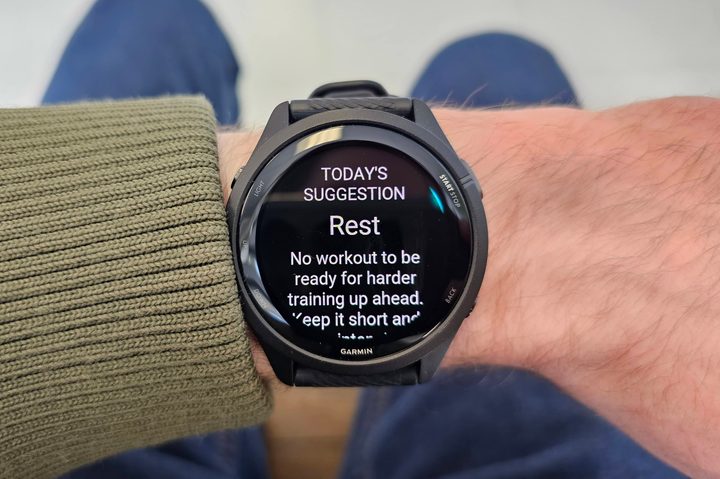 Someone wearing the Garmin Forerunner 265 on their wrist.