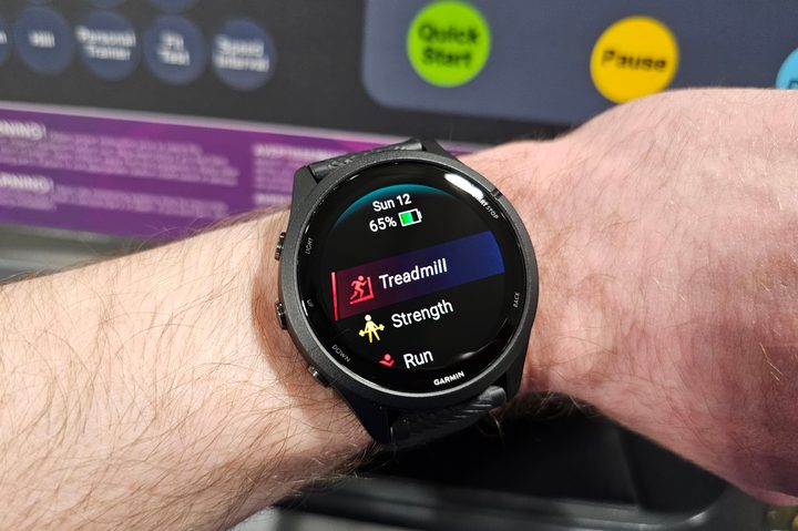 Someone wearing the Garmin Forerunner 265 on their wrist.