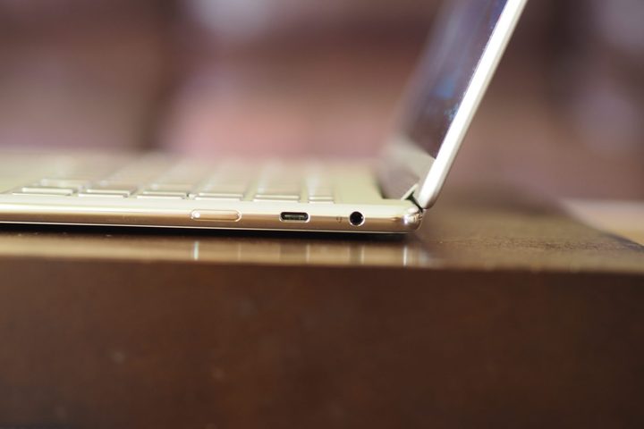 Lenovo Yoga 9i Gen 8 side view showing ports and lid.