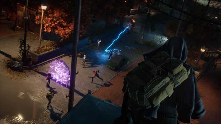 A Redfall squad fights through the streets.