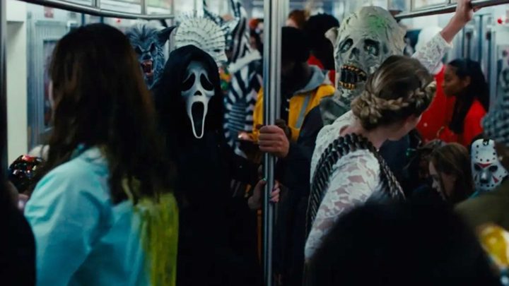 Ghostface rides the subway in Scream 6.