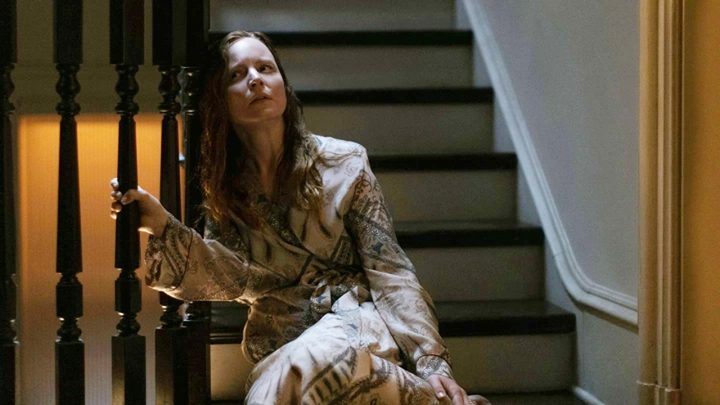 Dorothy slumped on the stairs in her home in Servant.