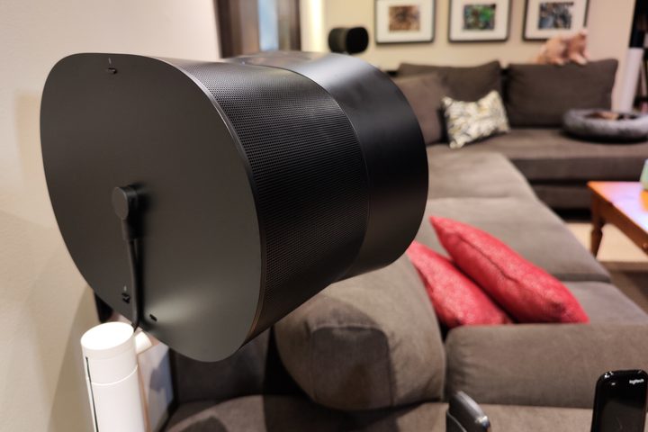 Sonos Era 300 on a speaker stand facing into a room.