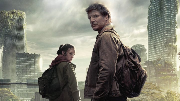 Joel and Ellie look at the camera in The Last of Us.