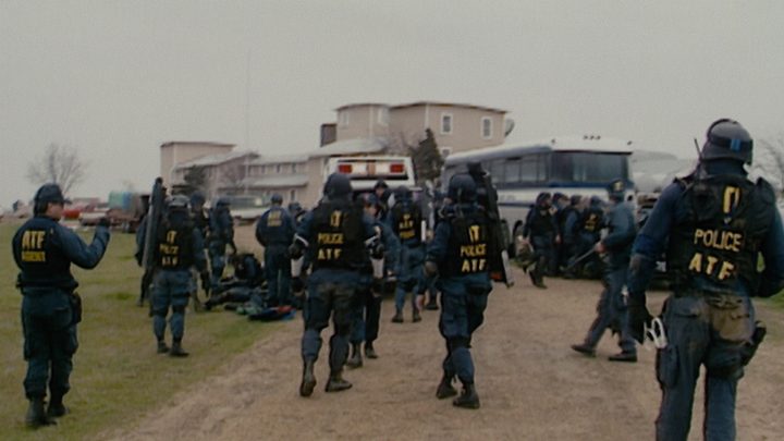 ATF agents approaching the Branch Davidian compound in Waco Texas in Waco: American Apocalypse.