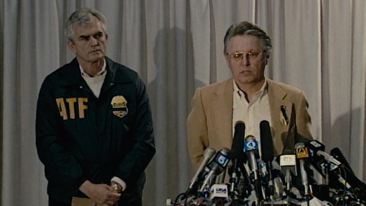 Historical footage of a press conference during the Waco events in 1993 in Waco: American Apocalypse.