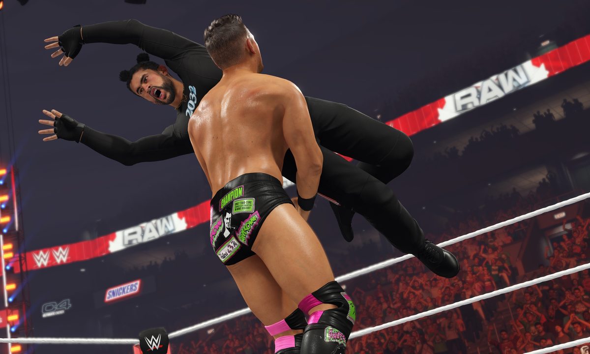 Bad Bunny performs a cross-body on The Miz in WWE 2K23.