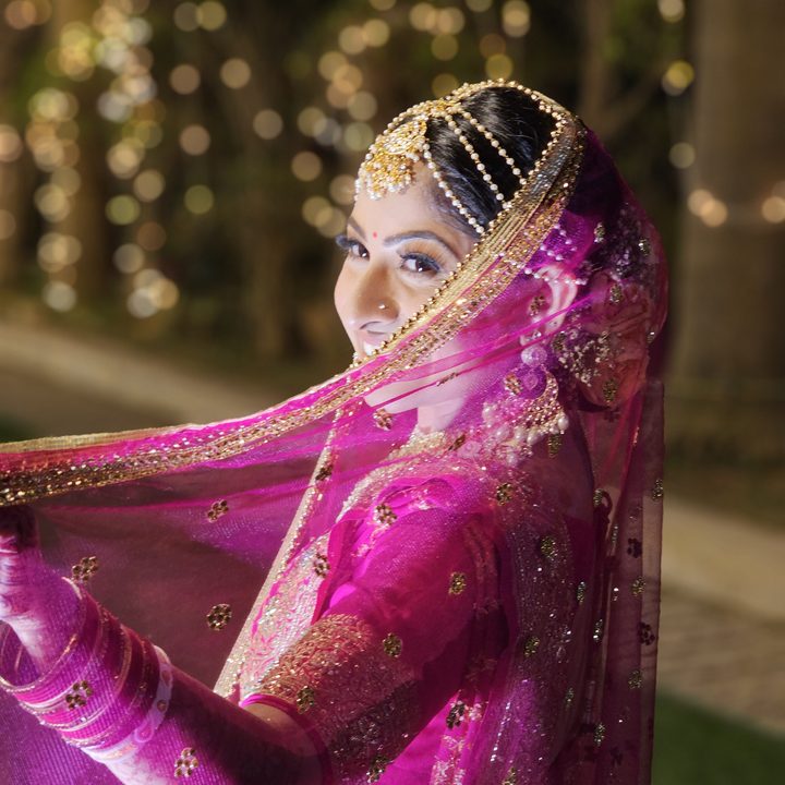 Indian bride in her wedding dress captured with the Samsung Galaxy S23 Ultra’s 3x telephoto portrait mode camera.