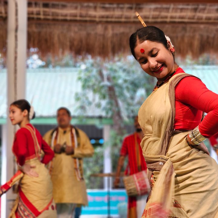 Traditional Assamese performing tribal dance at a cultural show captured with the Samsung Galaxy S23 Ultra’s 3x telephoto portrait mode camera.