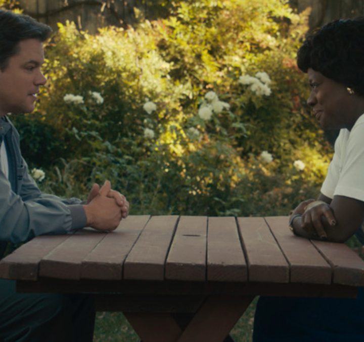 Matt Damon and Viola Davis sit at a table in Air.
