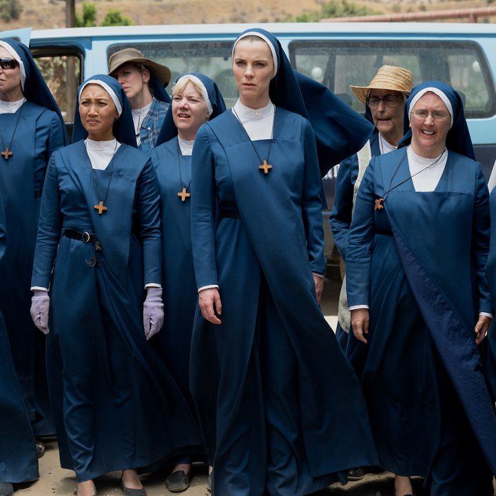 A group of nuns stand in unison in Mrs. Davis.