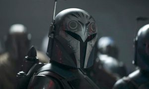 Bo-Katan stands near her fellow Mandalorians in The Mandalorian season 3 episode 7.