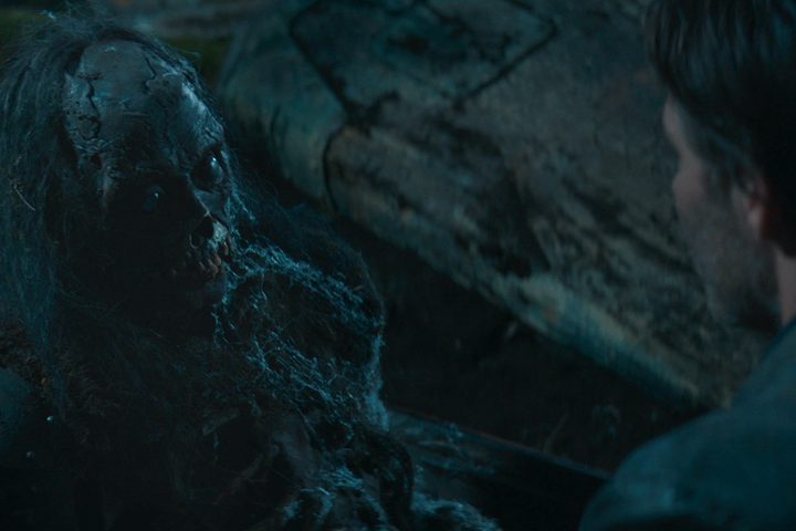 A reanimated corpse looks at Chris Pine's Edgin in Dungeons & Dragons: Honor Among Thieves.