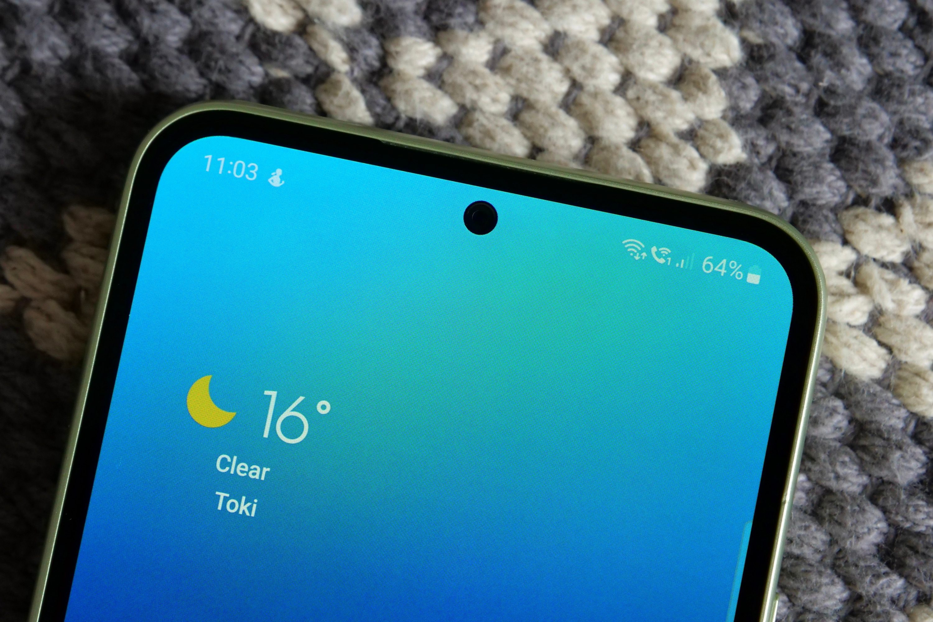 The Samsung Galaxy A54's screen bezels and selfie camera.