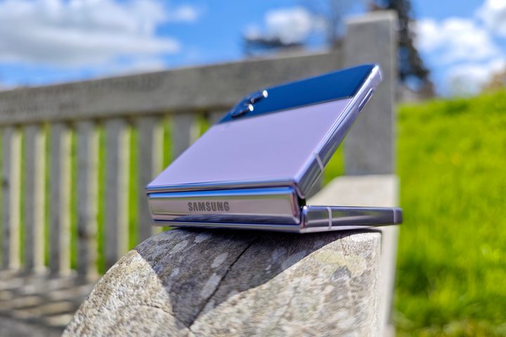 The Galaxy Z Flip 4's hinge, and the phone half open.