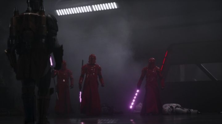 Paz Vizsla confronting three Praetorian Guards in The Mandalorian season 3.
