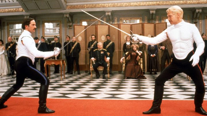 Laertes and Hamlet having a sword duel in Hamlet.